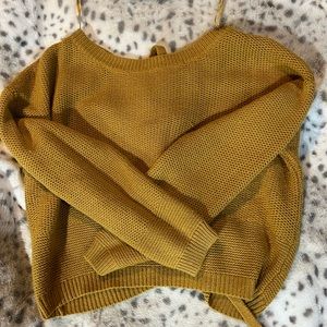 Mustard yellow, open back.